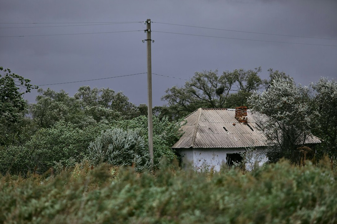 Abandoned stone building in the Uruguayan countryside under dramatic sky