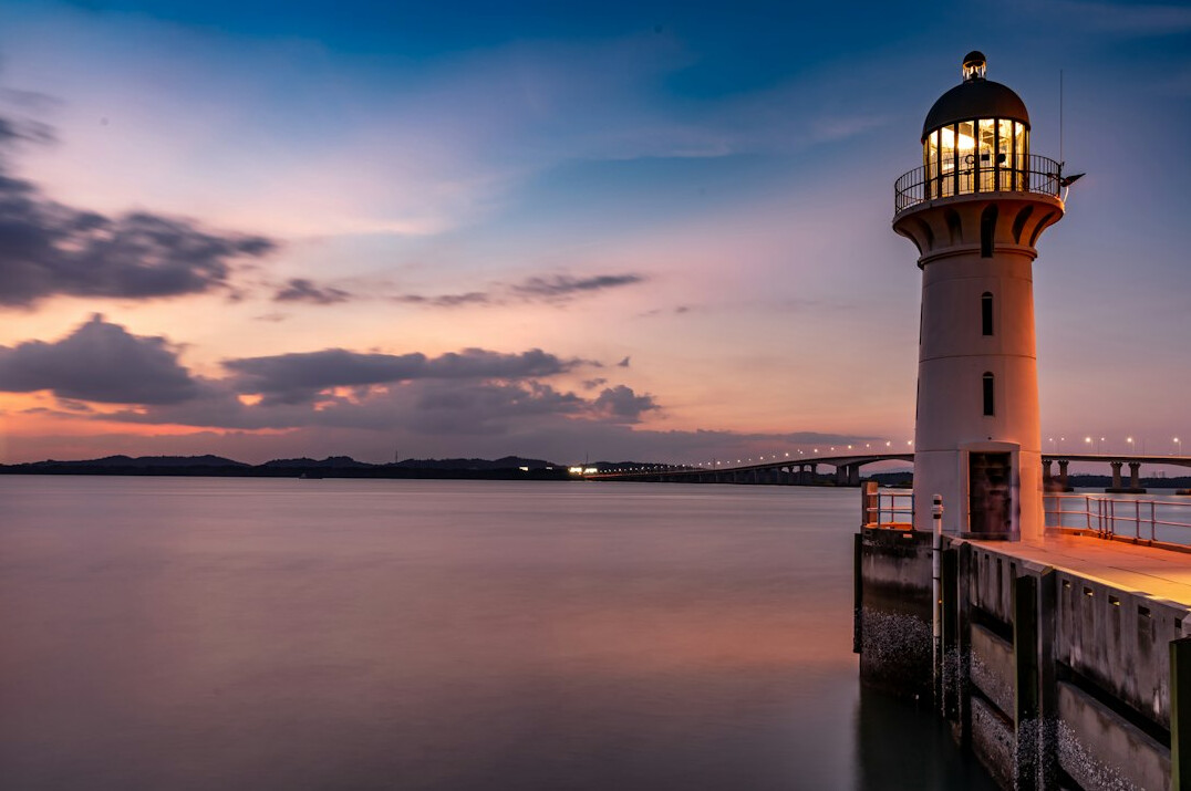 Historic lighthouse and old port of Montevideo at golden hour