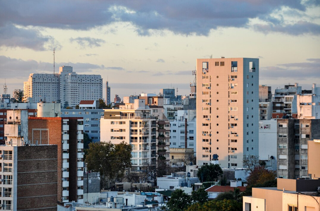 Aerial view of Montevideo coastline Rambla and city at sunset